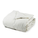 Folded white comforter made of 100% cotton shell and down alternative fill